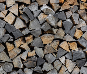 Stack pile of firewood oak wooden logs