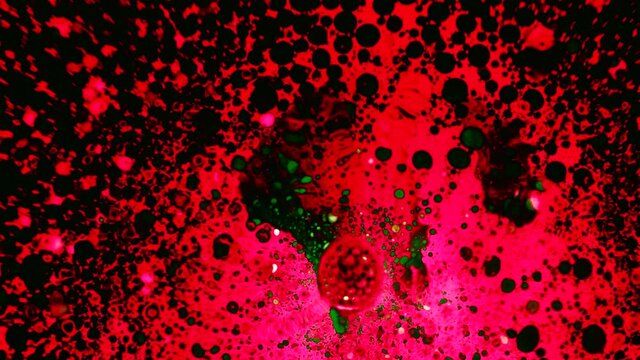 Abstract colorful paint reaction. Psychedelic liquid light show, dye patterns in water, oil, paint. Marble background for visual effects, motion graphics. Swirl pattern, ink explosion