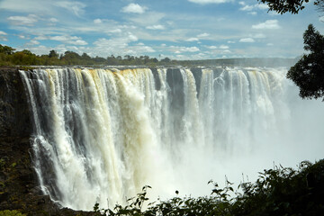Victoria Falls or  Mosi-oa-Tunya  (The Smoke that Thunders) and Zambezi River Zimbabwe / Zambia...