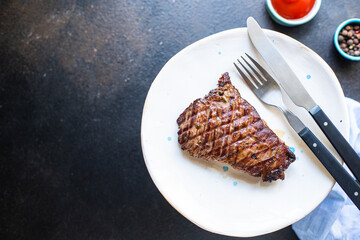 fresh steak beef juicy grilled meat barbecue portion B-B-Q on the table, healthy food meal snack copy space food background rustic. top view keto or paleo diet