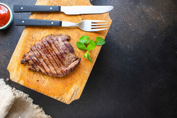 fresh steak beef juicy grilled meat barbecue portion B-B-Q on the table, healthy food meal snack copy space food background rustic. top view keto or paleo diet