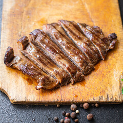 fresh steak beef juicy grilled meat barbecue portion B-B-Q on the table, healthy food meal snack copy space food background rustic. top view keto or paleo diet