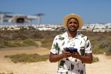 A black guy pilots a drone