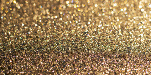 Golden background with bokeh and three-dimensional patterns. Abstract background