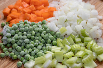 Selection of Chopped Vegetables on a Cutting Board ready to be used to cook a meal