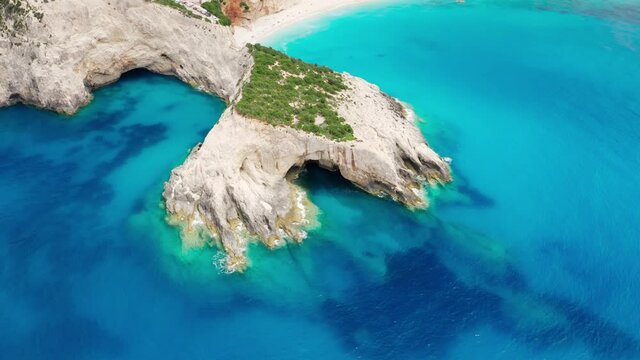 Aerial view of Lefkada coast Porto Katsiki with turquoise sea water and tall cliffs, summertime vacations in Greece.