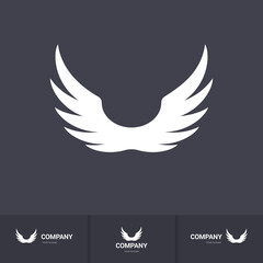 Pair Wings of Bird Icon in Flat Style. Winged Logo Company Icon Flying, Eagle, Falcon, Phoenix, or Hawk Wings. Brand or Logotype on Dark Background