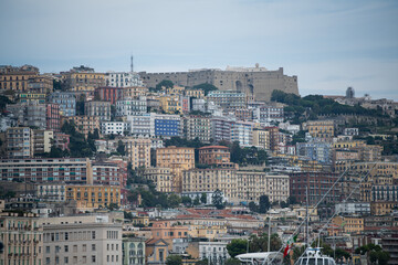 Fototapeta premium Colorful houses cascade panorama view in Naples old town. Italian colorful houses city view