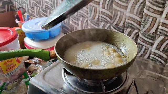 Making Rosogolla-a Bengali sweet