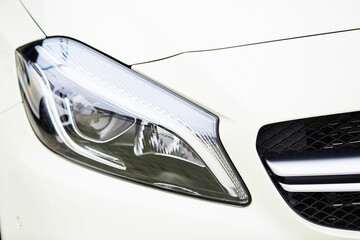 Detail on one of the LED headlights of a car.