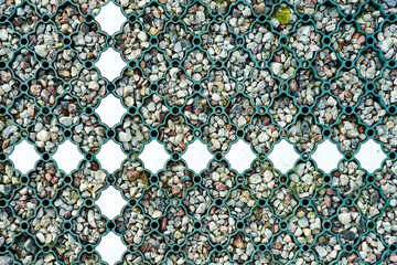 new modern car park gravel base with a installed green plastic grid