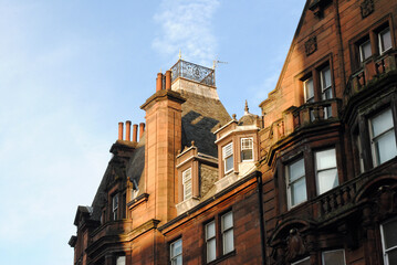 Cupola & Chimneys on Roof Line of 19th Century Stone Office Building 