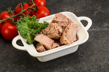 Canned tuna fillet in the bowl