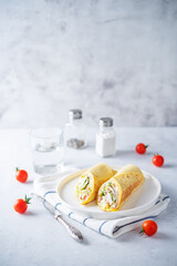 Corn tortilla with chicken and vegetables in a plate
