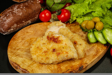 Roasted hot crispy pork schnitzel