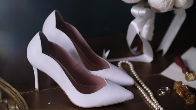 the bride's shoes on the table