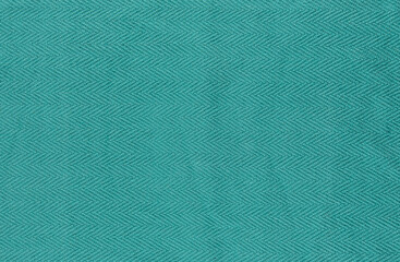 Closeup of green textile. Fabric details backdrop
