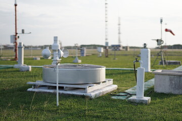 meteorological equipment and sensors placed in a wide and spacious meteorological instrument park....