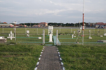 meteorological equipment and sensors placed in a wide and spacious meteorological instrument park....