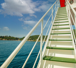 Stairs with closed door on a sea landscape 