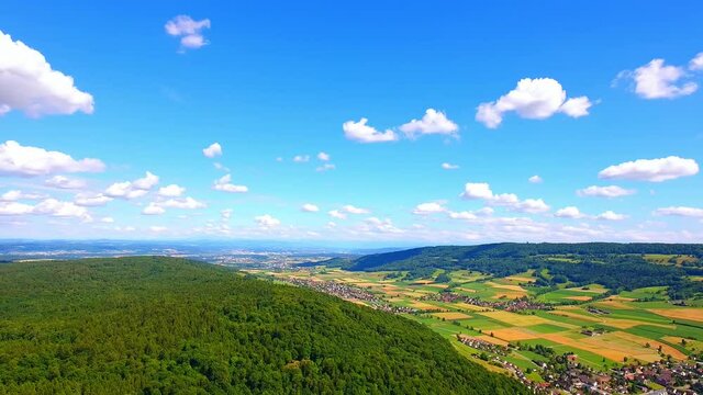 Aerial photography of houses, trees and farmland in the municipality of Niederdwenningen, Switzerland