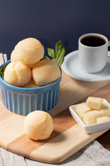 Delicious Brazilian cheese bread (pão de queijo) served with coffee.