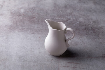 Teapot creamer, Cup and saucer on Cement Board