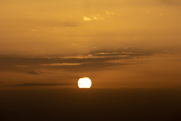 Colorful dramatic sky with cloud at sunset.Sky with sun background