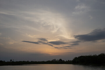 Obraz na płótnie Canvas Colorful dramatic sky with cloud at sunset