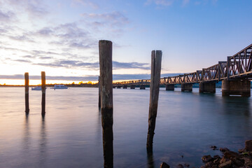 Tauranga's historic railway bridge at sunrise