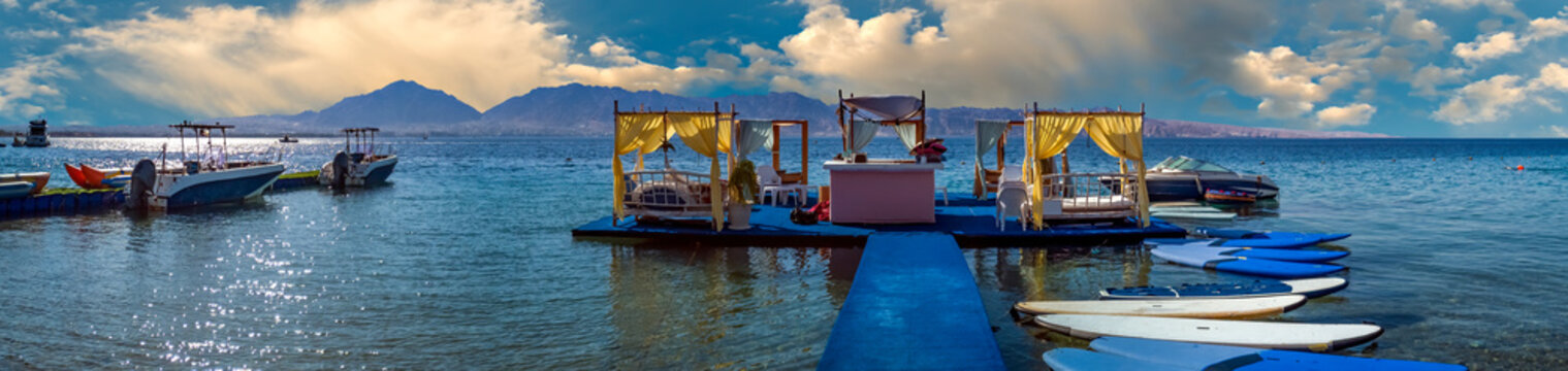 Water sport floating island and resting facilities on sandy beach of the Red Sea, Sinai, Middle East
