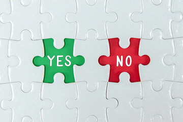 Yes and No text on a Jigsaw Puzzle - business concept