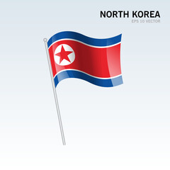 North Korea waving flag isolated on gray background