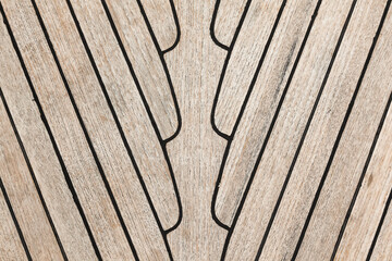 Texture of teak deck on a yacht closeup.