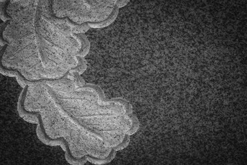 oak leaves engraved on grey polished granite slate, kury gray finland granite © Neils