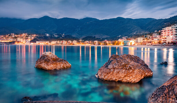 Astonishing spring view of Potam Public beach. Exciting morning seascape of Adriatic sea. Fantastic cityscape of Himare town, Albania, Europe. Traveling concept background.