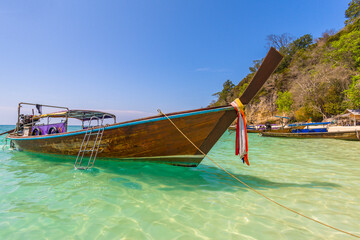 Fototapeta na wymiar Long tail boats on Bamboo island near Phi-Phi islands, Thailand