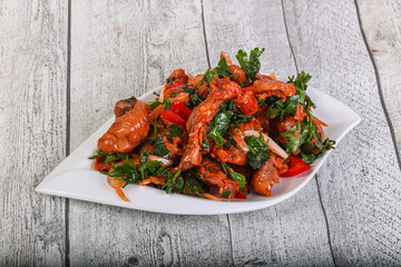 Marinated chicken breast slices with cilantro