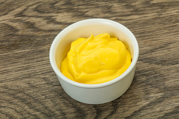 Natural cheese sauce in the bowl