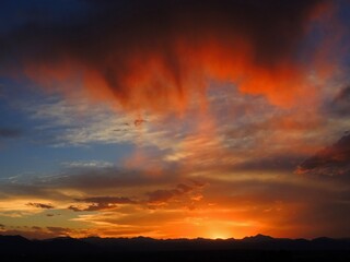Fiery sunset along the colorado  Rocky Mountain   front range, as seen from Broomfield, colorado 
