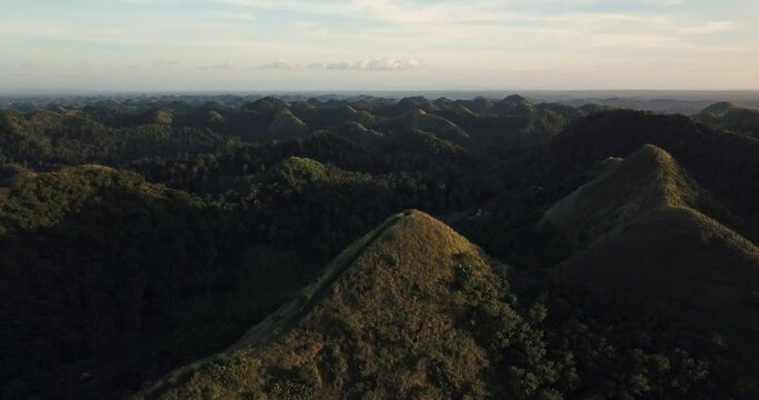 Aerial view of green hills at sunset, Bicol, Philippines