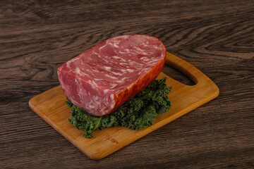 Beef ham piece over board