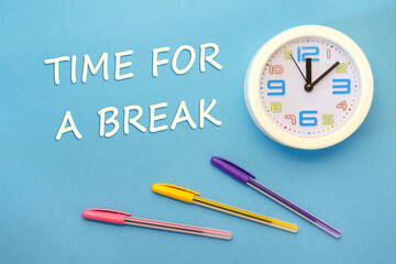 Time for a break - lettering on a blue background and clock