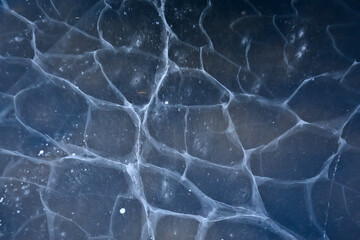 cracked ice texture, abstract seasonal winter cold background, natural ice, broken ice on a lake