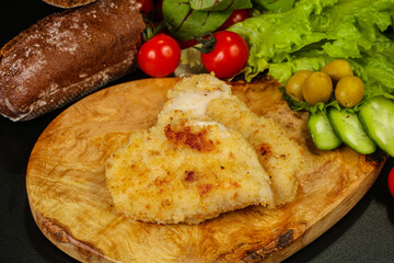Roasted hot crispy pork schnitzel