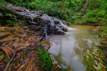 Beauty hidden waterfall in asian forest