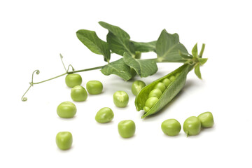 Pods of green peas with leaves isolated on white background
