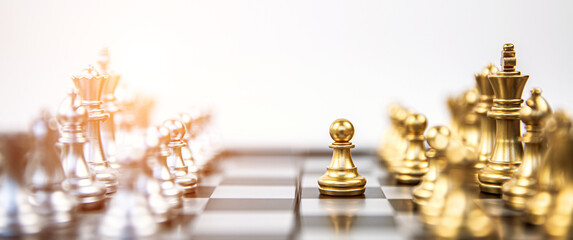 Close-up chess standing first in line teamwork on chess board concepts of business team and leadership strategy and organization risk management.