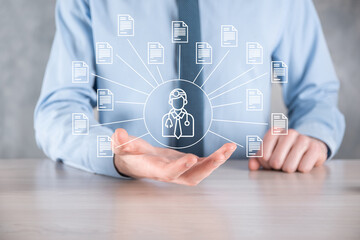 Document Management System DMS .Businessman hold doctor and document icon.Software for archiving, searching and managing corporate files and information.Internet Technology Concept.Digital security.