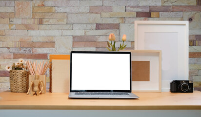 Modern workspace with computer with blank screen and equipment on white table.Blank screen for your information.